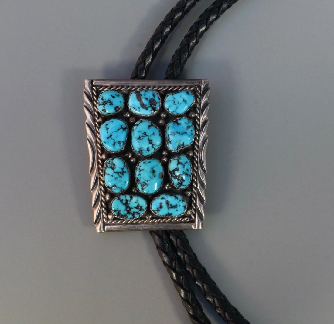 VINTAGE NAVAJO STERLING SILVER AND TURQUOISE BOLO TIE SIGNED SPENCER: VINTAGE NAVAJO STERLING SILVER AND TURQUOISE BOLO TIE SIGNED SPENCER Item Description: 2" Tall 1 3/4 " Wide