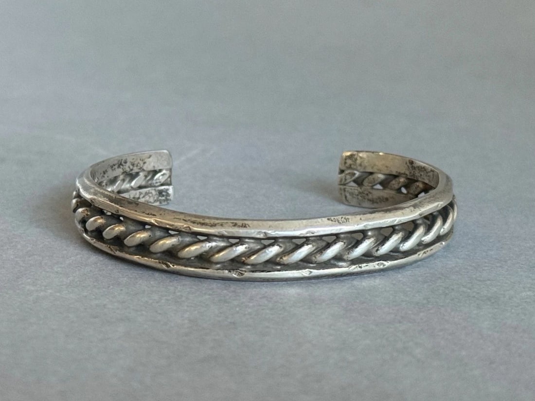 OLD PAWN NAVAJO STERLING SILVER BRACELET: OLD PAWN NAVAJO STERLING SILVER BRACELET Old Pawn Navajo Sterling Silver Bracelet 3/8" Tall ..5" Inside with a 1 1/4" Opening ..30 Grams
