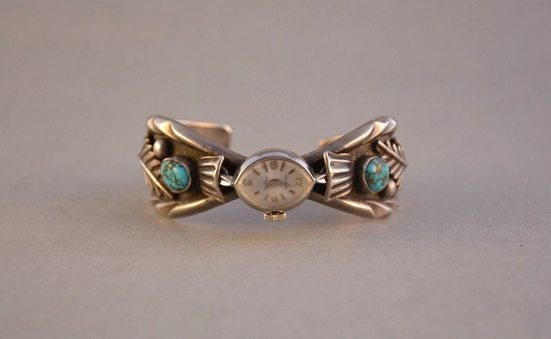 OLD PAWN NAVAJO SILVER TURQUOISE LADIES WATCH BRACELET - WALTHAM WATCH - 6 1/8": OLD PAWN NAVAJO SILVER TURQUOISE LADIES WATCH BRACELET - WALTHAM WATCH - 6 1/8" Item Description: This Navajo sterling silver watch bracelet cuff has been beautifully designed and crafted. The thick c