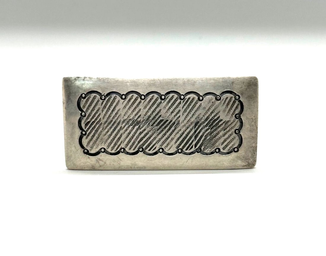 OLD PAWN UNUSUAL NAVAJO STERLING SILVER HAND STAMPED BELT BUCKLE: OLD PAWN UNUSUAL NAVAJO STERLING SILVER HAND STAMPED BELT BUCKLE Item Description: 1 1/8 " Tall x 2 1/2" Wide Weight 1 oz.