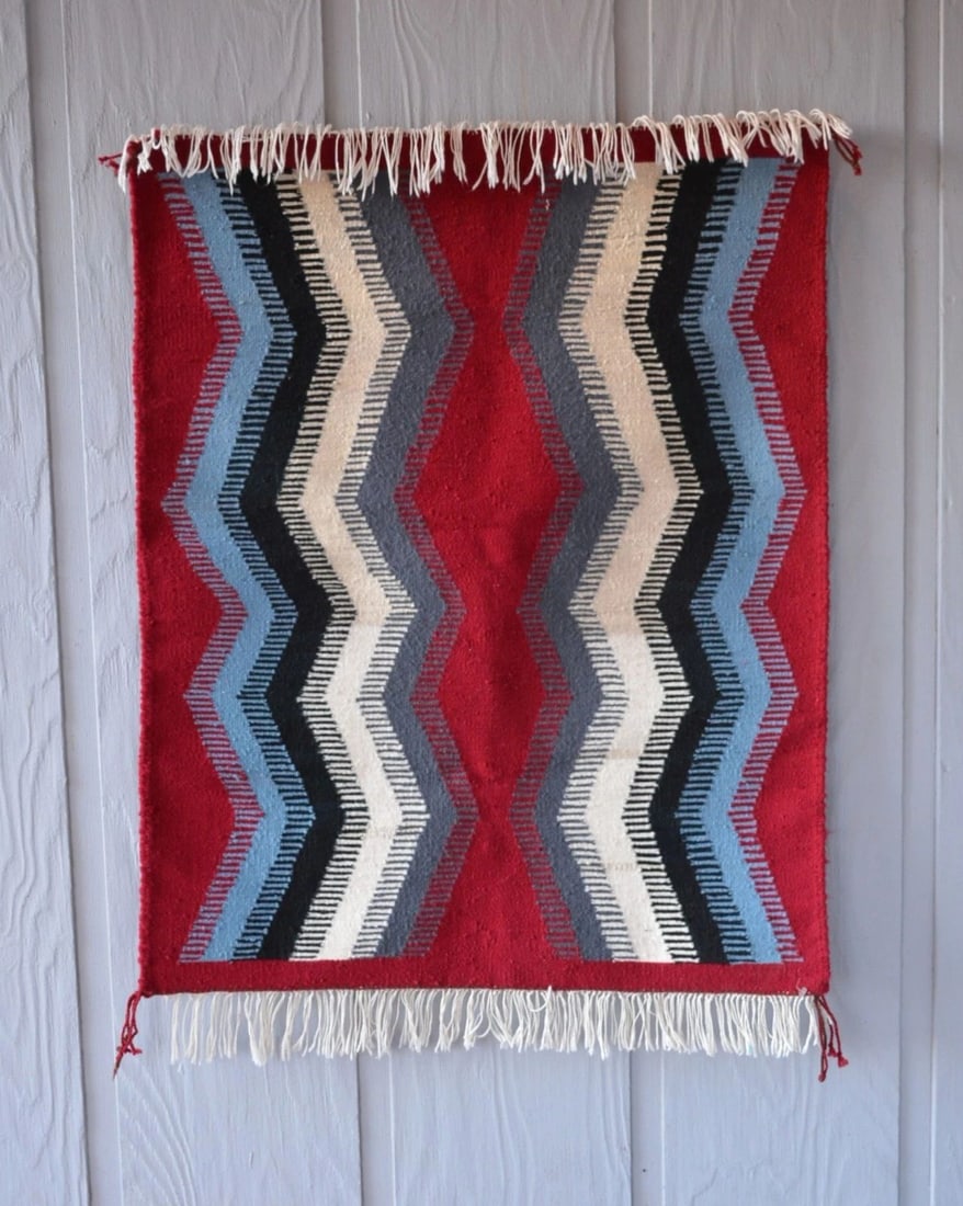 NAVAJO RUG EYE DAZZLER PATTERN - RED GREY BLACK WHITE BLUE - 36" X 28.5": NAVAJO RUG EYE DAZZLER PATTERN - RED GREY BLACK WHITE BLUE - 36" X 28.5" Measures 36" x 28.5" not including 3" fringe. Navajo rug **Both sides of the rug are shown in the photos.**