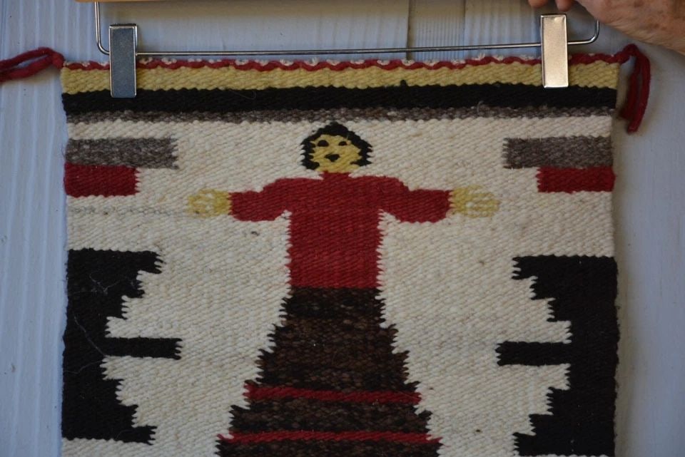 VINTAGE NAVAJO PICTORIAL WEAVING RUG - SINGLE FIGURE WOMAN - 15" X 14.5": VINTAGE NAVAJO PICTORIAL WEAVING RUG - SINGLE FIGURE WOMAN - 15" X 14.5" This wonderful single figure pictorial Navajo rug is in great condition. It measures 15" x 14.5"
