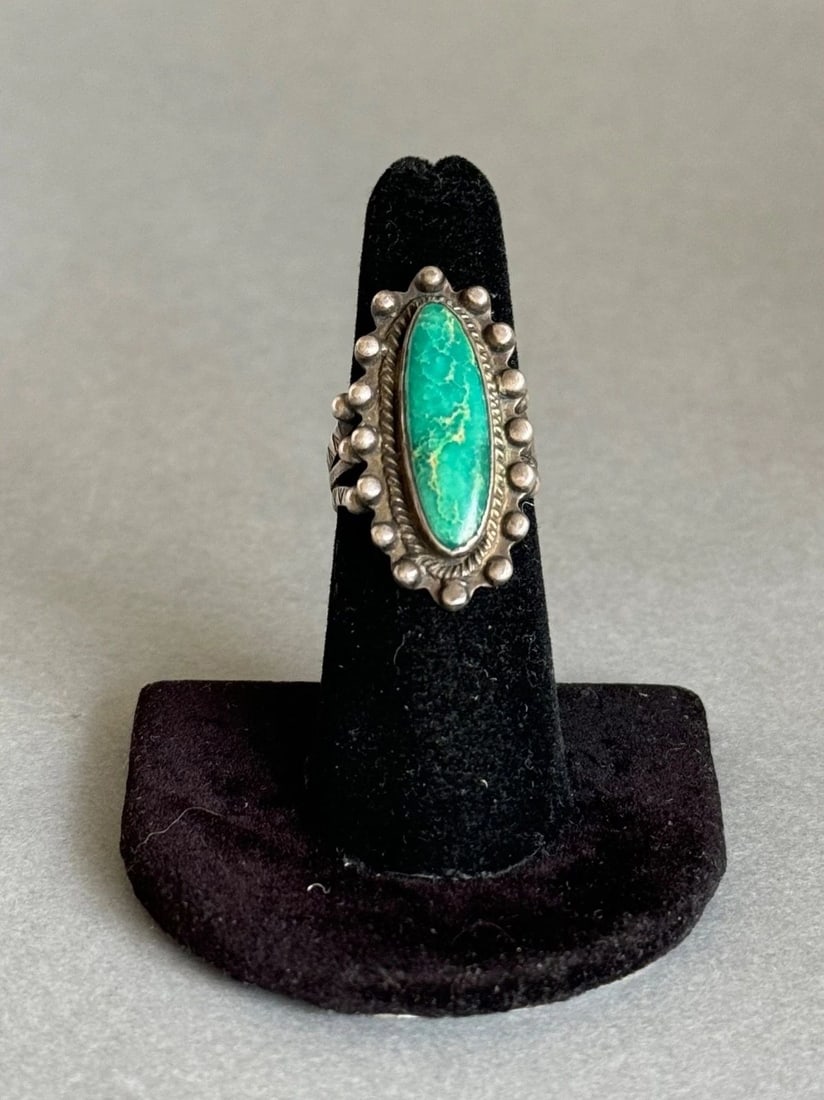 OLD PAWN NAVAJO STERLING SILVER AND TURQUOISE RING. SIZE 6 1/4: OLD PAWN NAVAJO STERLING SILVER AND TURQUOISE RING. SIZE 6 1/4 Old Pawn Navajo Sterling Silver and Turquoise Ring. Size 6 1/4 1 1/4” Tall