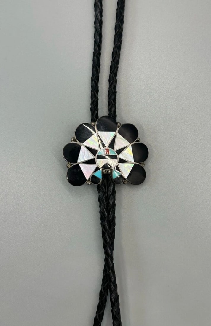 VINTAGE SUN FACE ZUNI INLAYED BOLO TIE: VINTAGE SUN FACE ZUNI INLAYED BOLO TIE Item Description: 1 1/2" Tall x 1 3/4 " Wide ..