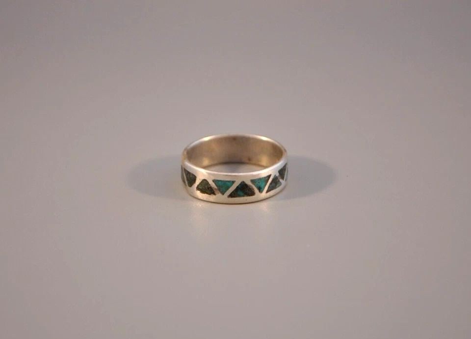 OLD PAWN NAVAJO STERLING SILVER RING - TURQUOISE SIZE 11: OLD PAWN NAVAJO STERLING SILVER RING - TURQUOISE SIZE 11 Weight 5.10 Grams 1/4" Tall Old Pawn Jewelry dates from the early 1900s to the 1970s. Most of it is not signed because it wasn't the Native Ame