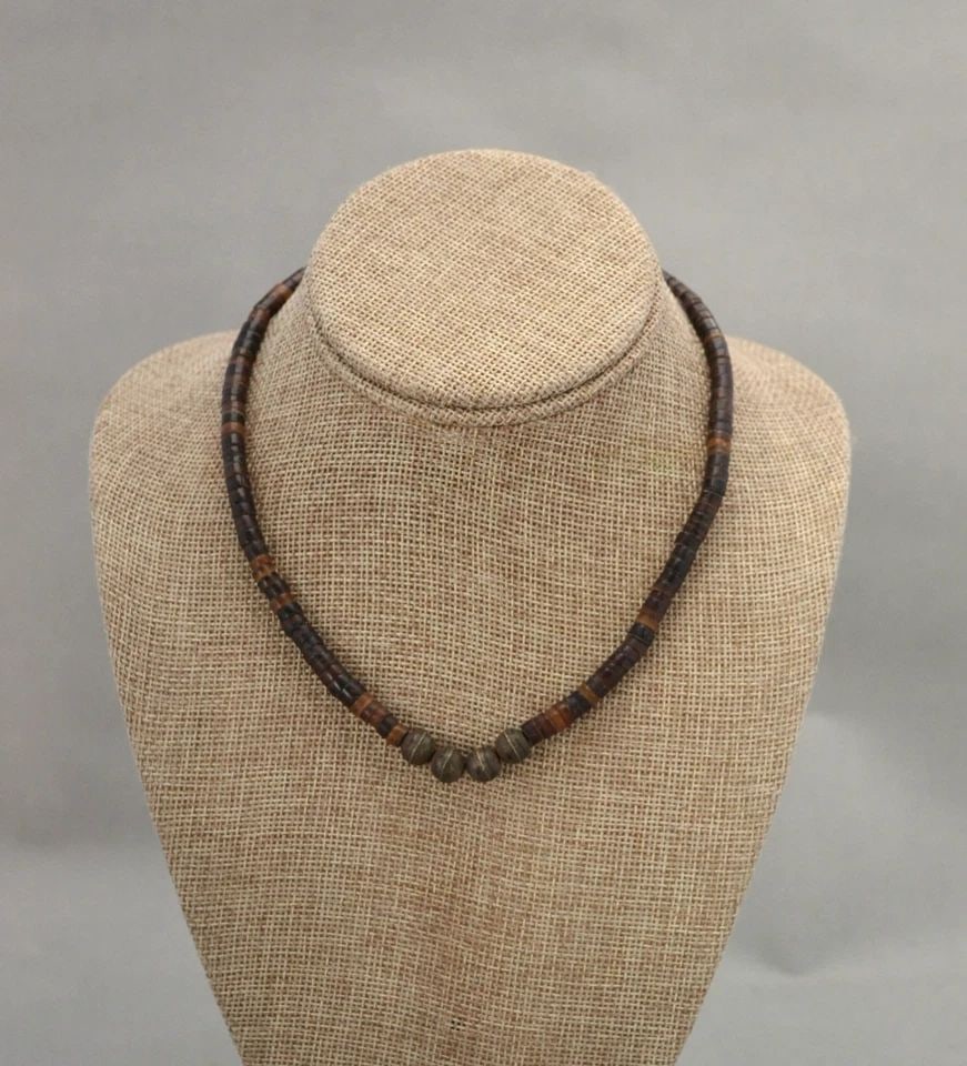 OLD PAWN OLD HEISHI SHELL NAVAJO NECKLACE W. BENCH PRESSED SILVER BEADS - 16": OLD PAWN OLD HEISHI SHELL NAVAJO NECKLACE W. BENCH PRESSED SILVER BEADS - 16" This old pawn Navajo heishi shell necklace has hand done sterling silver beads. It is 16" long and in good condition.
