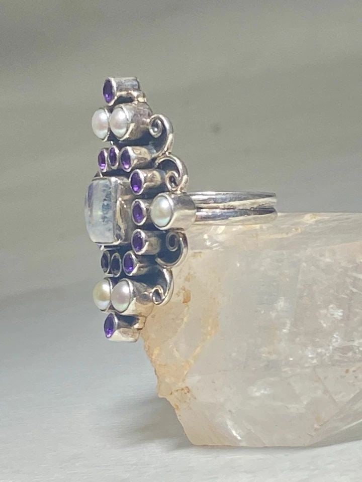 LONG MOONSTONE RING AMETHYST PEARL STERLING SILVER WOMEN GIRLS: LONG MOONSTONE RING AMETHYST PEARL STERLING SILVER WOMEN GIRLS Long Moonstone Ring amethyst pearl sterling silver women girls Size 5.75 Weight 10.8g Length 1 3/8" Width. 1" Thinnest part of band 5/32"