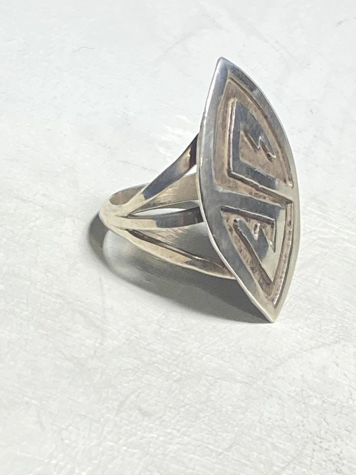 HOPI RING LONG SYMBOLS STERLING SILVER WOMEN GIRLS: HOPI RING LONG SYMBOLS STERLING SILVER WOMEN GIRLS Hopi ring long symbols sterling silver women girls Size 8.25 Weight 5.2g Length. 1 1/4" Width 3/4" Thinnest part of band 1/8"