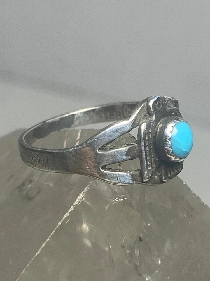 PHOENIX RING NAVAJO BAND TURQUOISE SOUTHWEST STERLING SILVER WOMEN GIRLS: PHOENIX RING NAVAJO BAND TURQUOISE SOUTHWEST STERLING SILVER WOMEN GIRLS Phoenix ring Navajo band turquoise southwest sterling silver women girls Size 4.50 Weight 1.6g Widest part 3/8" Thinnest part 1