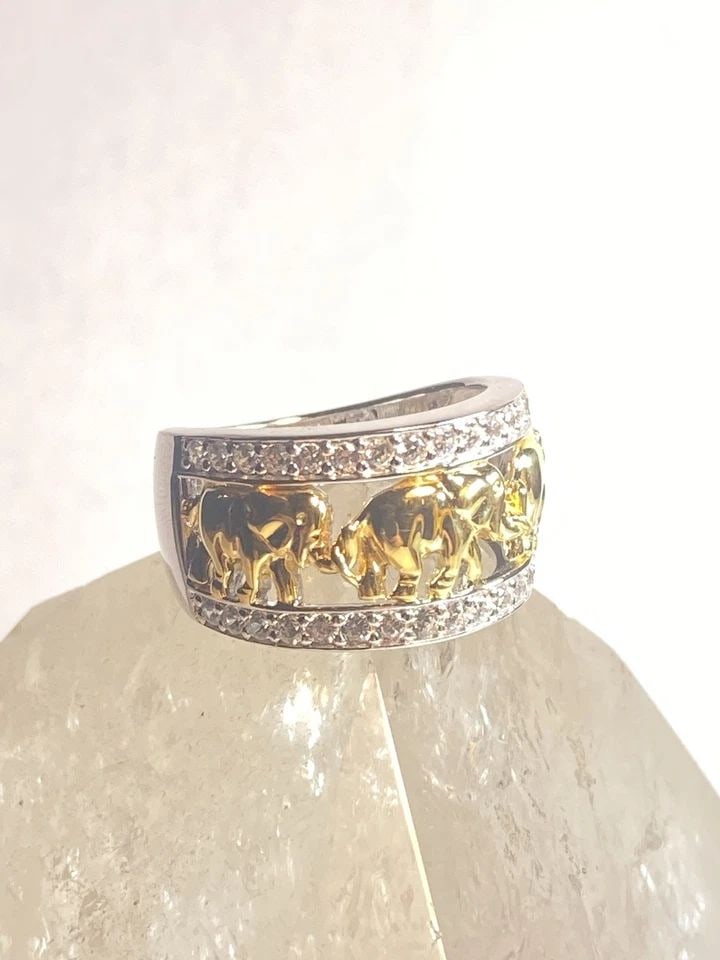 ELEPHANT RING SIZE 7.75 ANIMAL BAND STERLING SILVER WOMEN GIRL: ELEPHANT RING SIZE 7.75 ANIMAL BAND STERLING SILVER WOMEN GIRL Elephant ring animal band cocktail sterling silver women girl Some type of unknown gold over sterling silver Size 7.75 Between a size 7.7