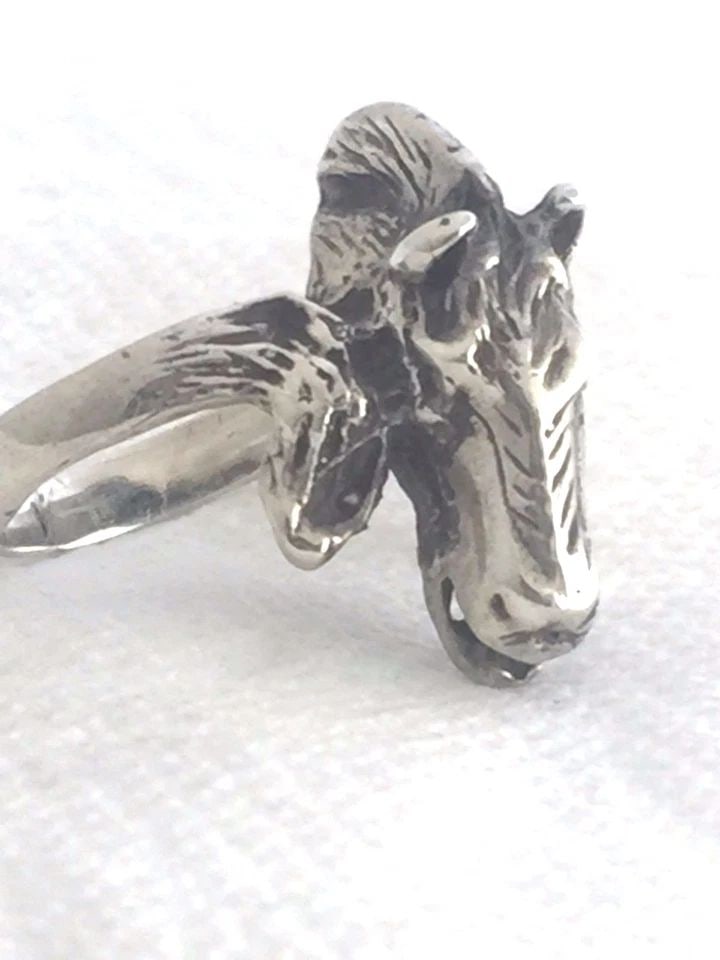 VINTAGE STERLING SILVER HORSE RING SIZE 4.25 4.8G PINKIE: VINTAGE STERLING SILVER HORSE RING SIZE 4.25 4.8G PINKIE Vintage Sterling Silver Horse Ring Size 4.25 Weight 4.8g Widest Part of the Band 27/32" Narrowest Part of the Band 1/8" Free First Class shippi