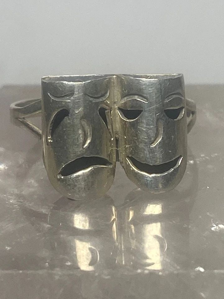 TRAGIC COMIC RING SIZE 5.50 STERLING SILVER TRAGEDY COMEDY THEATRICAL BAND THEAT: TRAGIC COMIC RING SIZE 5.50 STERLING SILVER TRAGEDY COMEDY THEATRICAL BAND THEAT Tragic comic ring sterling silver tragedy comedy theatrical band theater women girls Size 5.75 Between a size 5.75 and 