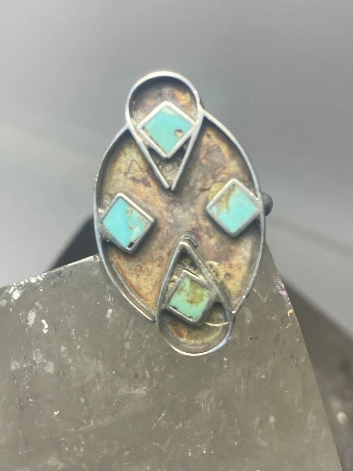 LONG RING TURQUOISE SIZE 6.50 SOUTHWEST STERLING SILVER WOMEN GIRLS V: LONG RING TURQUOISE SIZE 6.50 SOUTHWEST STERLING SILVER WOMEN GIRLS V Long ring turquoise southwest sterling silver women girls v Size 6.50 Weight 4.5g Length 1. 1/4" Width 5/8" Thinnest part of band 
