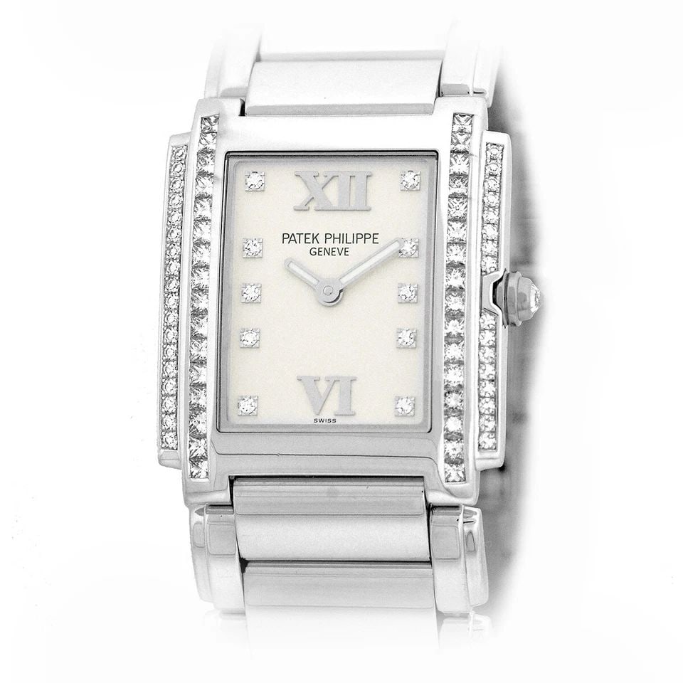 PATEK PHILIPPE 18K WHITE GOLD DIAMOND 4910 TWENTY 4 BOX WARRANTY 4910 G MINTY: PATEK PHILIPPE 18K WHITE GOLD DIAMOND 4910 TWENTY 4 BOX WARRANTY 4910 G MINTY PATEK PHILIPPE 18K White Gold Diamond 4910/20G Twenty 4 Quartz Warranty Papers Box Warranty Lady's 18K White Gold Patek Ph