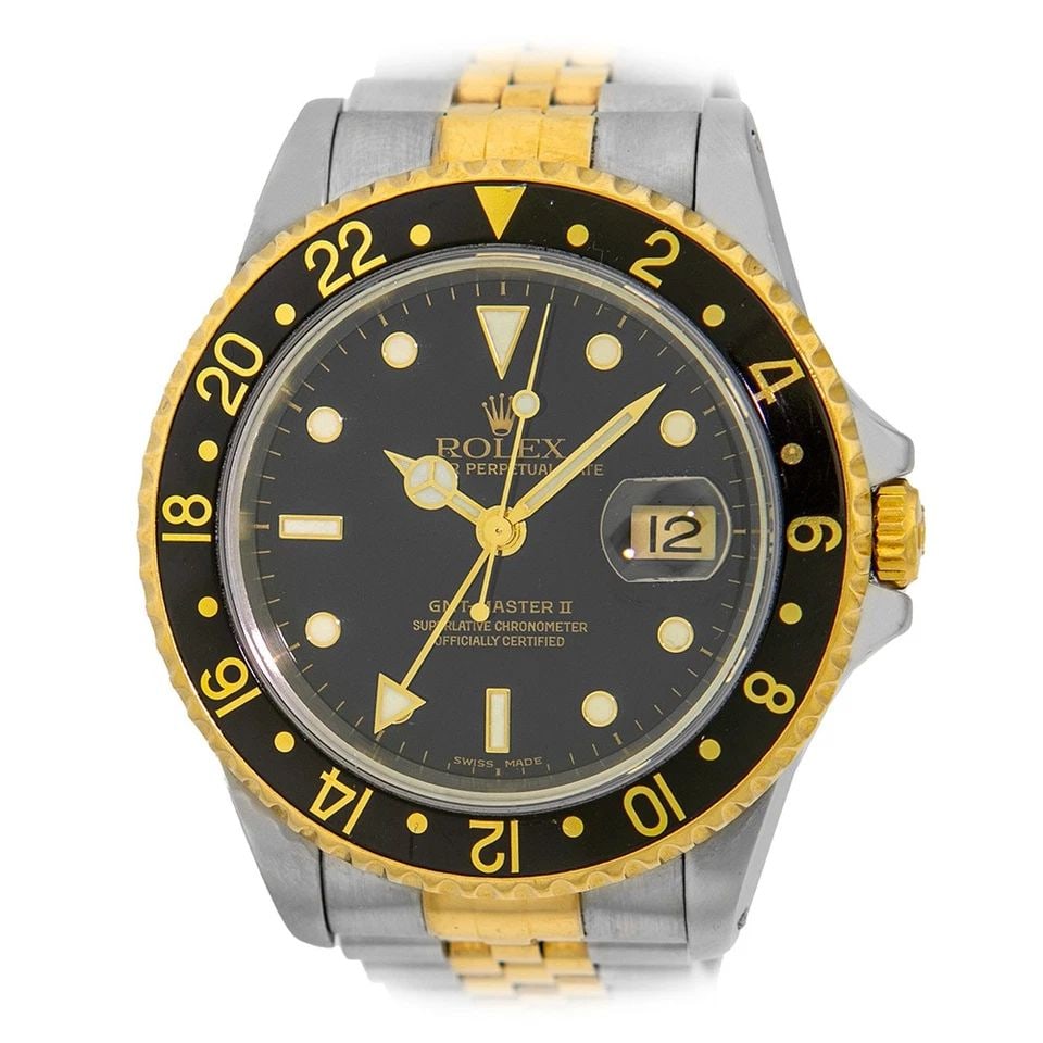 ROLEX STAINLESS STEEL & 18K YELLOW GOLD 40MM ROLEX "GMT MASTER II" 16713 BOX: ROLEX STAINLESS STEEL & 18K YELLOW GOLD 40MM ROLEX "GMT MASTER II" 16713 BOX BRAND: Rolex Model: GMT Master II Reference No: 16713 Gender: Gent’s Movement: Handmade Swiss Chronometer Certified (COSC