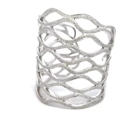 DIAMOND BRACELET 10 CARATS 18K WHITE GOLD HEAVY WAVE CUFF 2.6" WIDE 142 GRAMS: DIAMOND BRACELET 10 CARATS 18K WHITE GOLD HEAVY WAVE CUFF 2.6" WIDE 142 GRAMS This is a stunning large cuff bracelet; it is crafted from 18k white gold featuring a 2.60 inches wide band with 10 rows o