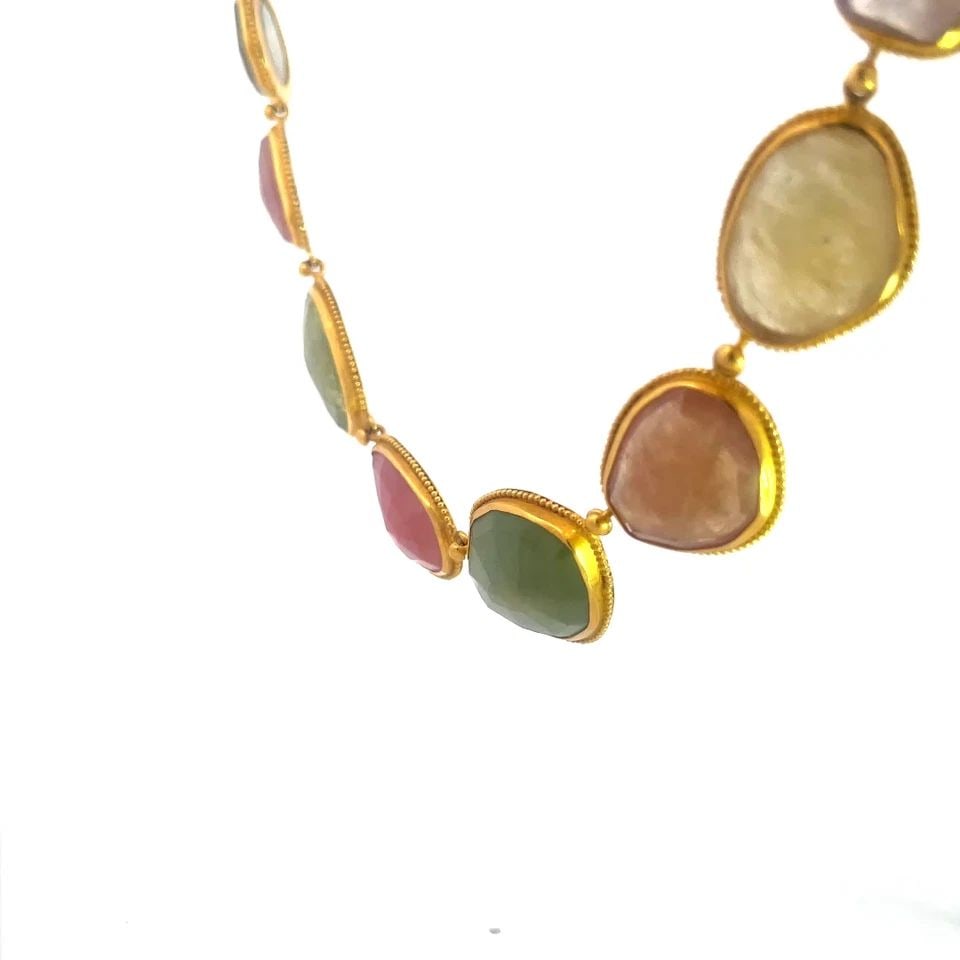 CAROLYN TYLER 22K GOLD COLLAR NECKLACE YELLOW GEMSTONE BEZEL SET LINKS: CAROLYN TYLER 22K GOLD COLLAR NECKLACE YELLOW GEMSTONE BEZEL SET LINKS The piece is a stunning 22k yellow gold collar necklace by designer Carolyn Tyler, it features a bezel set of multicolor gemstone