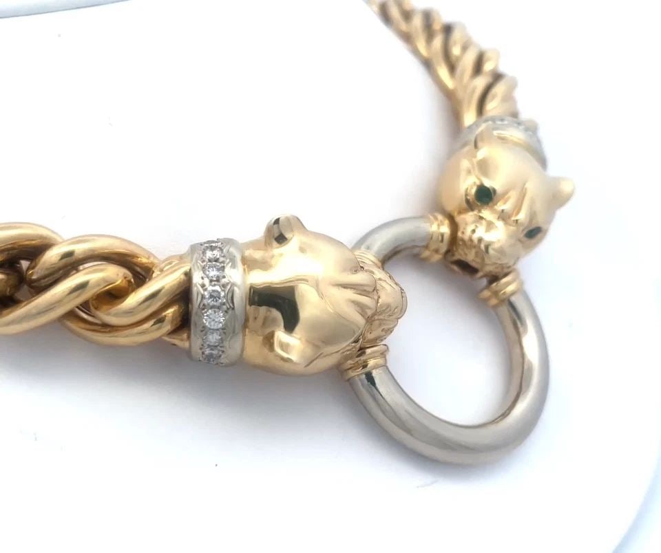 DIAMOND GOLD PANTHER NECKLACE 14K TWO TONE DOOR KNOCKER PUFFED CHAIN 116 GRAMS: DIAMOND GOLD PANTHER NECKLACE 14K TWO TONE DOOR KNOCKER PUFFED CHAIN 116 GRAMS This is an eye-catching impressive necklace; it is crafted with 14k yellow and white gold featuring the double panther po