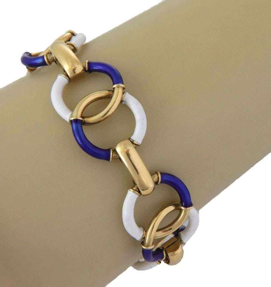 BRACELET 18K YELLOW GOLD ENAMEL FANCY INTERLACED LINK VINTAGE: Vintage 18k Yellow Gold Enamel Fancy Interlaced Link Bracelet Description This is a fashionable vintage bracelet, crafted from 18k yellow gold featuring 5 sets of double interlaced ring links showing 