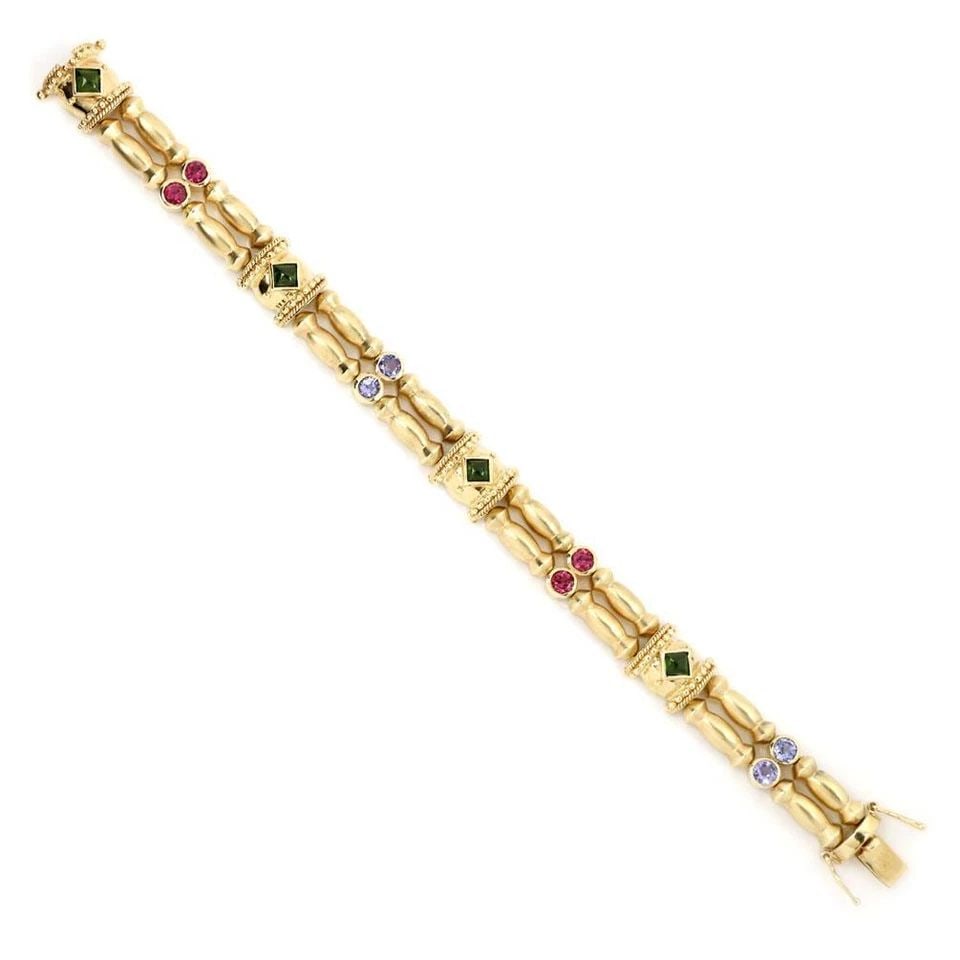 VINTAGE TANZANITE PINK GREEN TOURMALINE 14K YGOLD FANCY BRACELET LIQUIDATION: VINTAGE TANZANITE PINK GREEN TOURMALINE 14K YGOLD FANCY BRACELET Vintage Tanzanite Pink Green Tourmaline 14k YGold Fancy Bracelet Description This is a gorgeous fancy link bracelet, it is crafted from