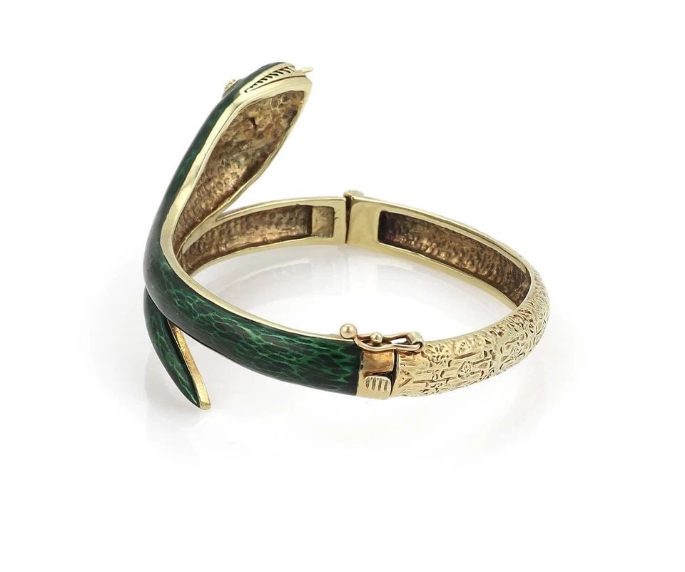 DIAMOND GOLD SNAKE BRACELET GREEN ENAMEL BYPASS BANGLE VINTAGE: Estate Diamond 14k Yellow Gold Green Enamel Bypass Snake Bracelet Description This is a fine Estate piece, it is crafted from 14k yellow gold featuring a hinged snake bracelet. The front half has the 