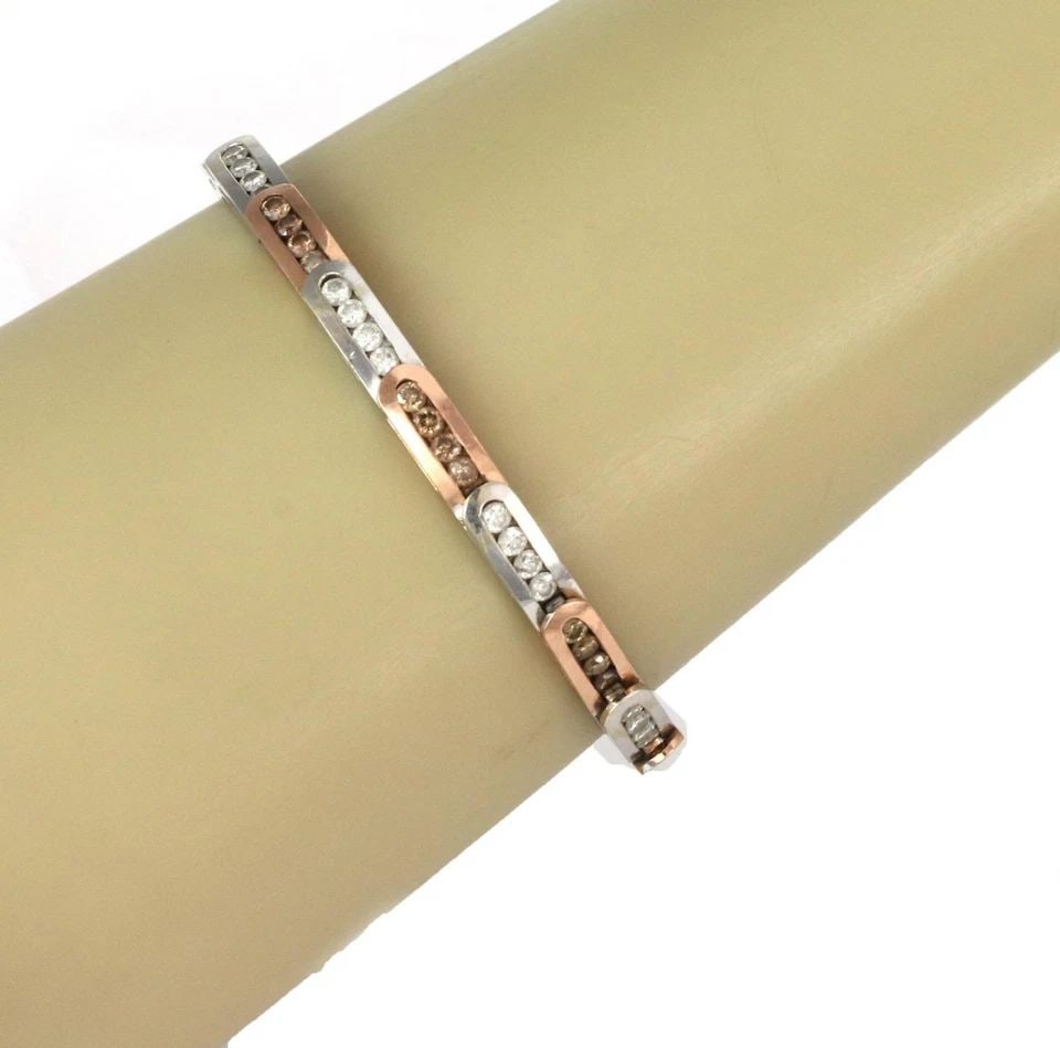 ESTATE 4CT CHAMPAGNE WHITE DIAMOND 14K ROSE WHITE GOLD BRACELET LIQUIDATION: ESTATE 4CT CHAMPAGNE WHITE DIAMOND 14K ROSE WHITE GOLD BRACELET Estate 4ct Champagne White Diamond 14k Rose White Gold Bracelet Description This is an elegant diamond bracelet, it is crafted from 14k 