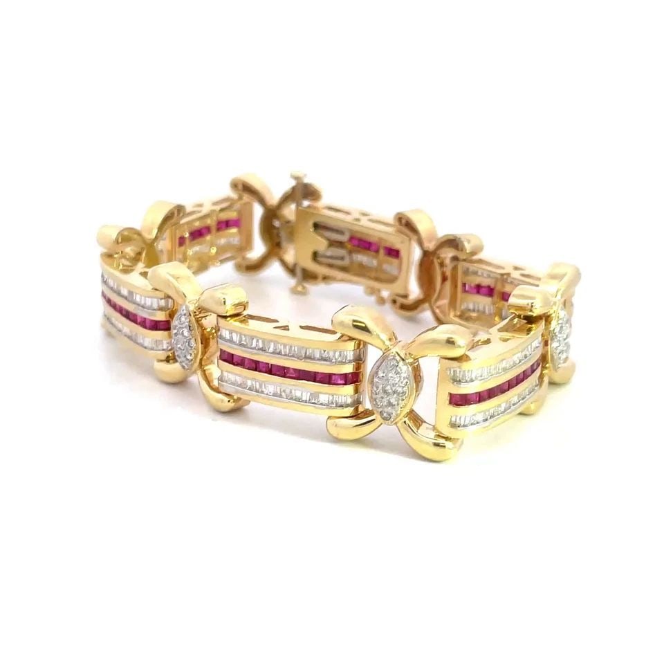RUBY DIAMOND GOLD BRACELET BAR X LINKS 14K YELLOW FLEX LINKS: RUBY DIAMOND GOLD BRACELET BAR X LINKS 14K YELLOW FLEX LINKS This is a stunning bracelet, crafted from 14k yellow gold featuring alternating wide bar links with X links. The bar links show 3 rows with