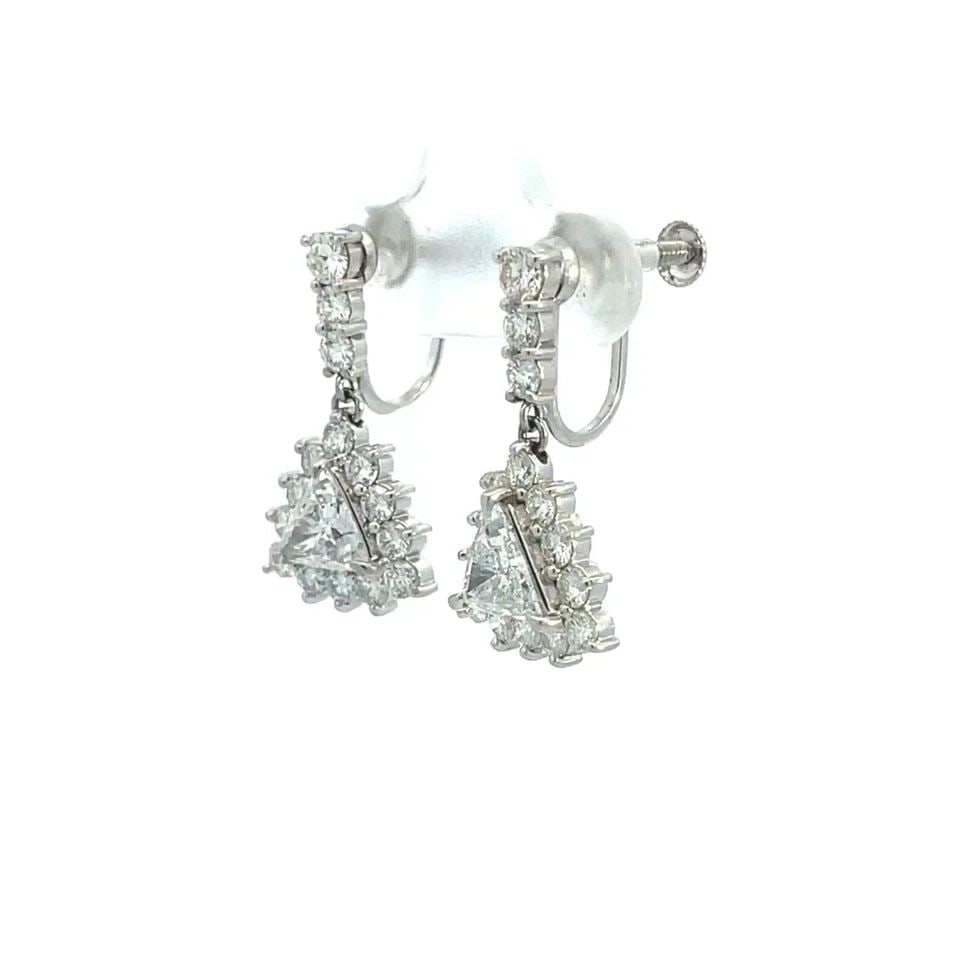 DIAMOND TRILLIONS PLATINUM EARRINGS FOR NON PIERCED: DIAMOND TRILLIONS PLATINUM EARRINGS FOR NON PIERCED These stunning earrings are finely crafted from platinum featuring a triangle cut frame dangling from a slim bar top with screw pressure backs. The 
