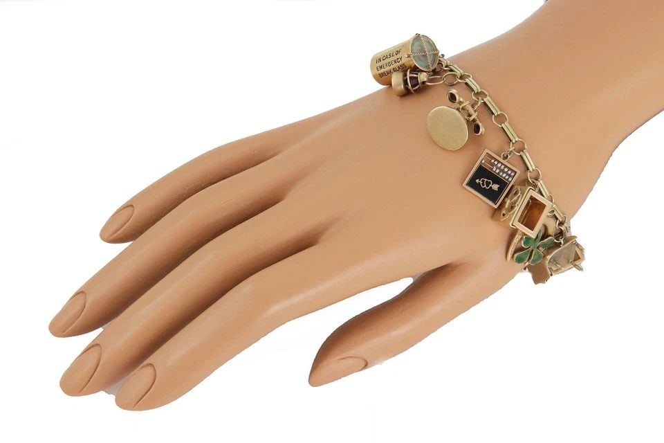 14K CHARM BRACELET 17 ASSORTED COLLECTIBLE CHARMS ESTATE (1 of 2)