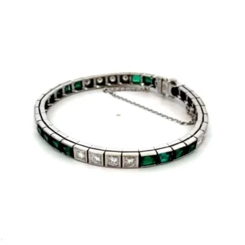 ART DECO ROUND CUT DIAMONDS 14K WHITE GOLD TENNIS BRACELET: ART DECO ROUND CUT DIAMONDS 14K WHITE GOLD TENNIS BRACELET This elegant vintage bracelet is crafted from 14k white gold with a fine polished finish and has 20 round cut diamonds and 16 rectangular gre