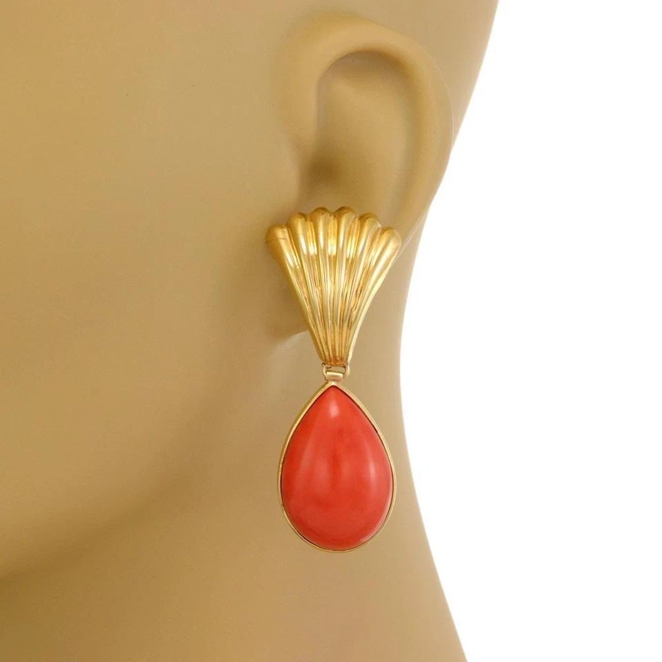 CORAL LONG DANGLE EARRINGS ESTATE 18K YELLOW GOLD PEAR SHAPE: CORAL LONG DANGLE EARRINGS ESTATE 18K YELLOW GOLD PEAR SHAPE Estate 18k Yellow Gold Pear Shape Coral Long Dangle Earrings Description This is a pair of beautiful long drop dangle earrings, crafted fro