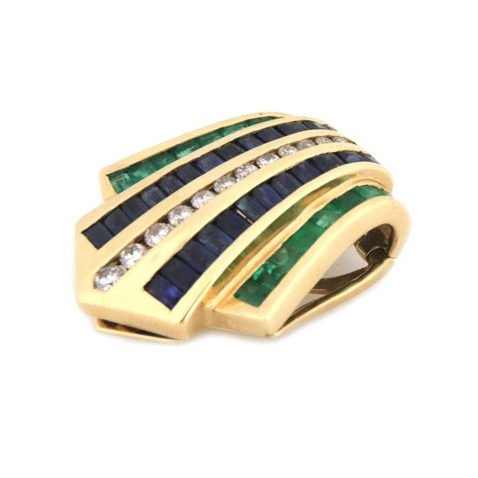 SAPPHIRE EMERALD DIAMOND 14K YELLOW GOLD RIBBON STYLE SLIDE PENDANT: SAPPHIRE EMERALD DIAMOND 14K YELLOW GOLD RIBBON STYLE SLIDE PENDANT Sapphire Emerald Diamond 14k Yellow Gold Ribbon Style Slide Pendant Description This lovely pendant is crafted from 14k yellow gold 