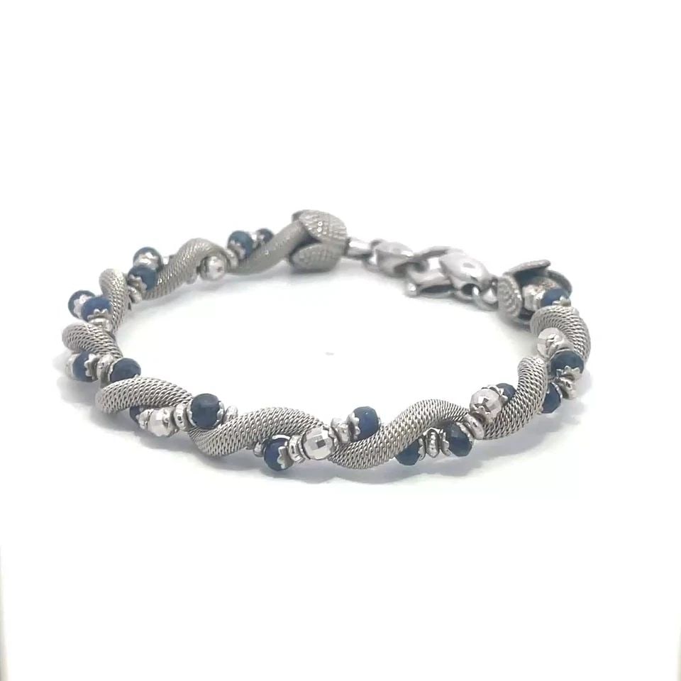 SUN DAY GOLD BRACELET SAPPHIRE 18K WHITE MESH INTERLACED LINKS: SUN DAY GOLD BRACELET SAPPHIRE 18K WHITE MESH INTERLACED LINKS This lovely bracelet is from Sun Day Jeweler, it is crafted from 18k white gold featuring double strand interlaced into a flex band. One 
