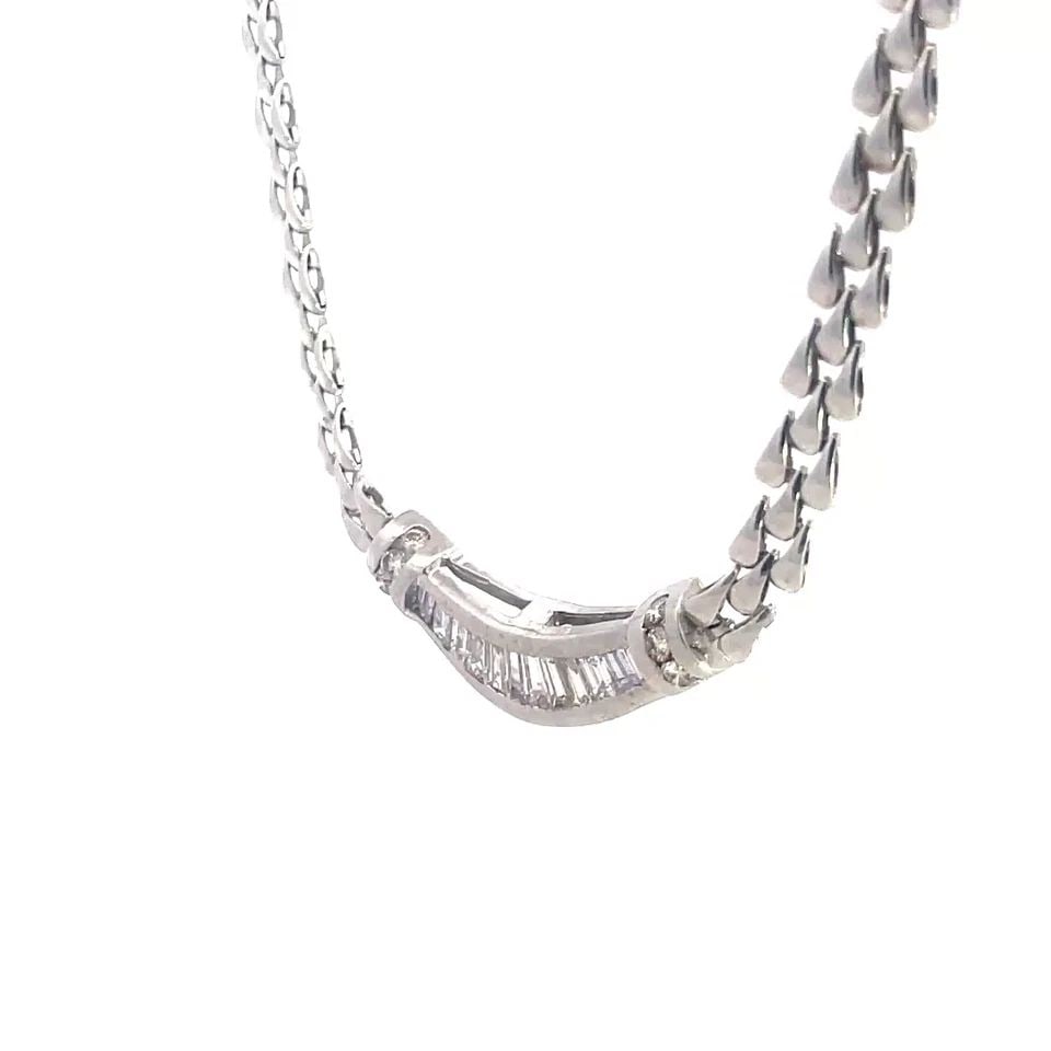 DIAMOND GOLD BAR PENDANT 18K&14K WHITE TRIPLE ROW TEARDROP LINK NECKLACE: Add this beautiful necklace to your collection, a sophisticated piece crafted in 18k & 14k white gold. The pendant showcases a elegant curved bar design, adorned with a graduated channel set baguette 