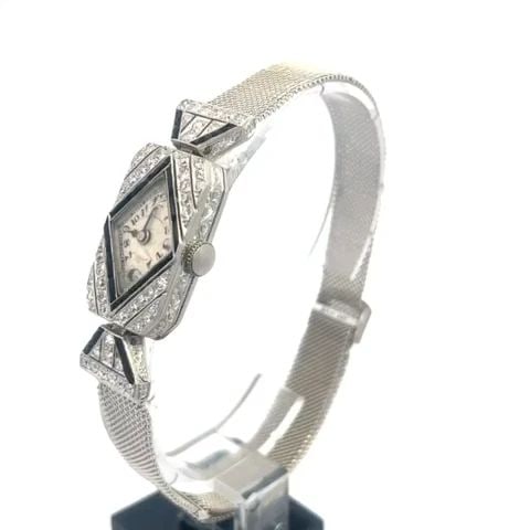 ART DECO PLATINUM GOLD WRISTWATCH LADIES GOLD ONYX DIAMOND CANDY WRAP STYLE: ART DECO PLATINUM GOLD WRISTWATCH LADIES GOLD ONYX DIAMOND CANDY WRAP STYLE This is a beautiful Art Deco ladies' wristwatch; the case is crafted from platinum and the back is 14k white gold. The case 