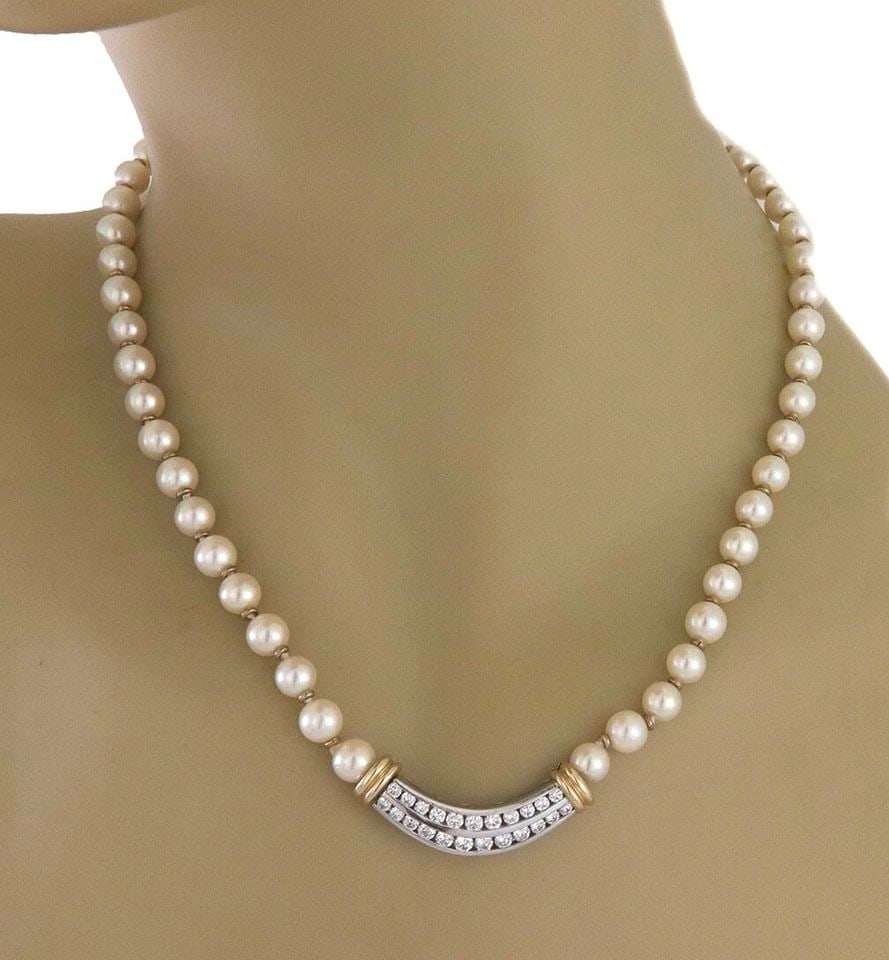DIAMOND PEARLS GOLD PENDANT NECKLACE 14K TWO TONE EAST WEST STYLE: DIAMOND PEARLS GOLD PENDANT NECKLACE 14K TWO TONE EAST WEST STYLE Elevate your jewelry collection with the diamonds and pearls 14k yellow and white gold necklace, a timeless piece that exudes sophisti