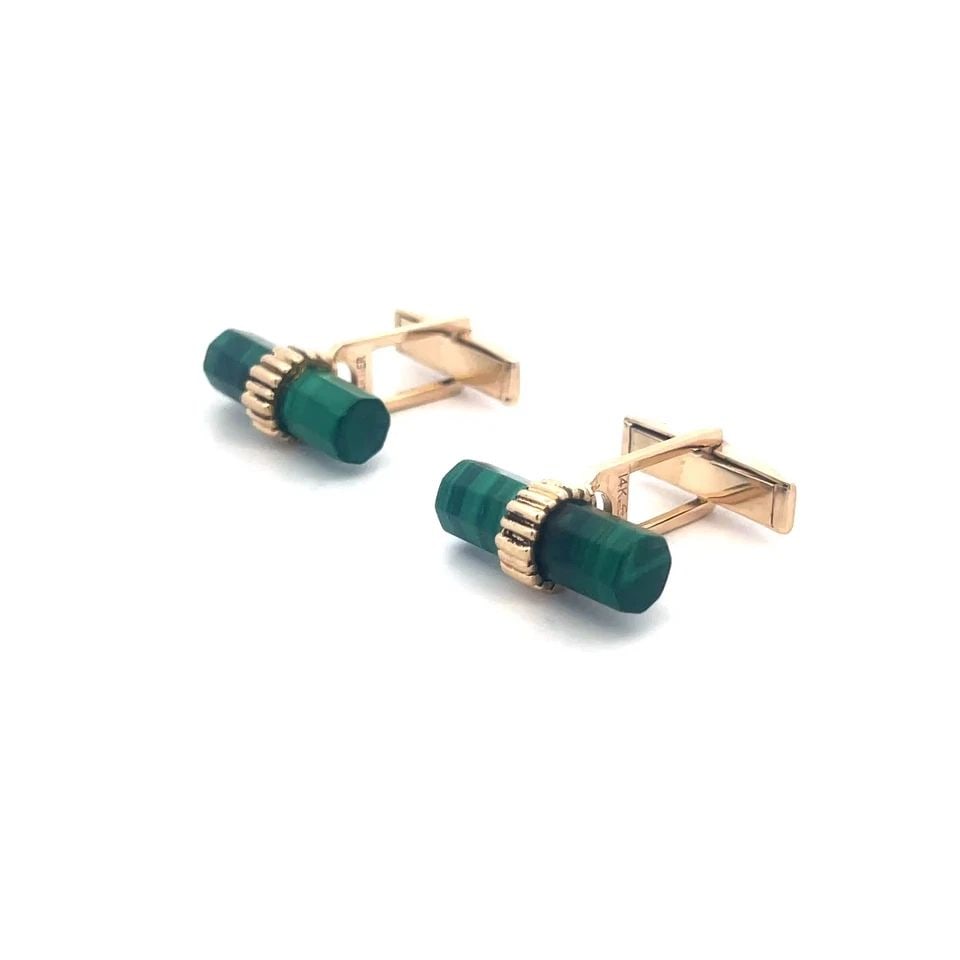 CARTIER GOLD MALACHITE CUFFLINKS 14K YELLOW VINTAGE WHALE BACK: The is a handsome vintage pair of cufflinks by Cartier, it features a natural green malachite stone depicting short columns held in 14k yellow gold clamps with whale backs. The cufflinks are vintage a