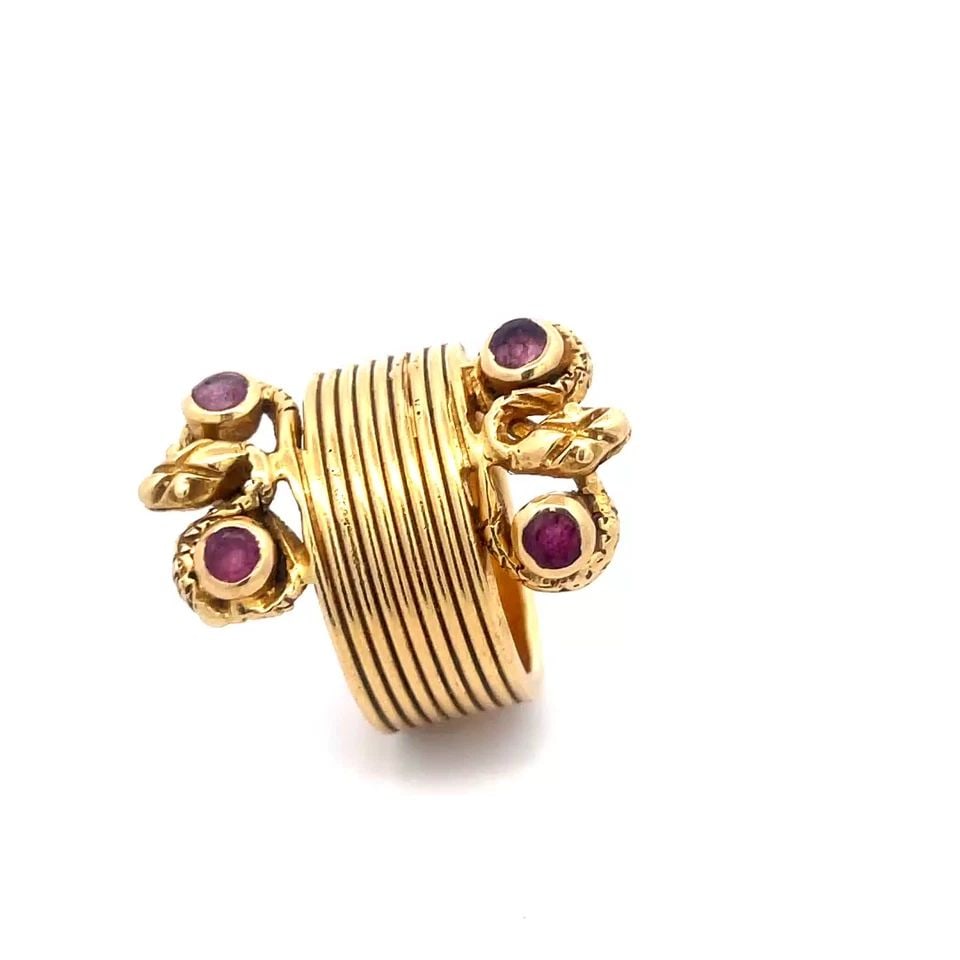 ILIAS LALAOUNIS RUBY GOLD SNAKE RING 18K YELLOW 9 ROWS BAND COILED SNAKES VINTGE: ILIAS LALAOUNIS RUBY GOLD SNAKE RING 18K YELLOW 9 ROWS BAND COILED SNAKES VINTGE This eye-catching authentic vintage ng from Lalaounis, it is crafted from 18k yellow gold featuring 9 wire band stacked