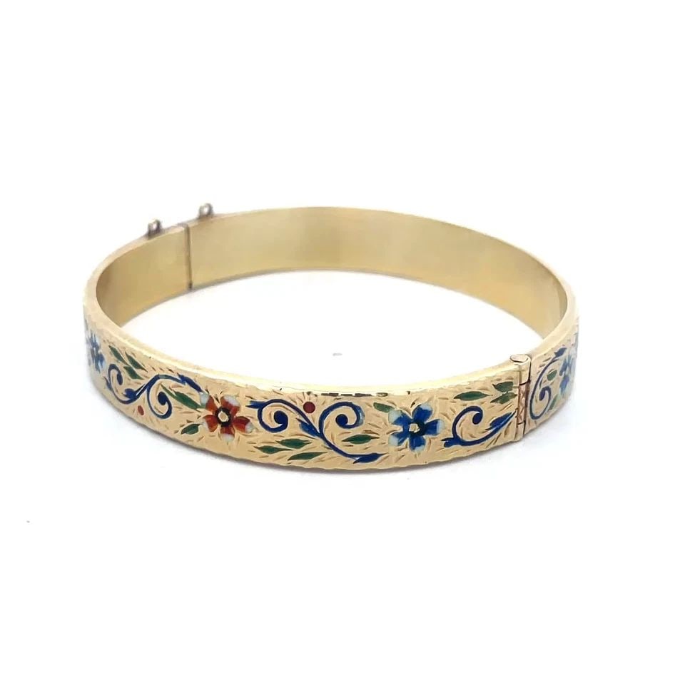 VINTAGE GOLD ENAMEL BRACELET 14K YELLOW WIDE HINGED FLORAL STYLE: VINTAGE GOLD ENAMEL BRACELET 14K YELLOW WIDE HINGED FLORAL STYLE This lovely vintage wide band hinged bracelet is crafted from 14k yellow gold featuring a 10mm wide band with push lock clasp. Around t