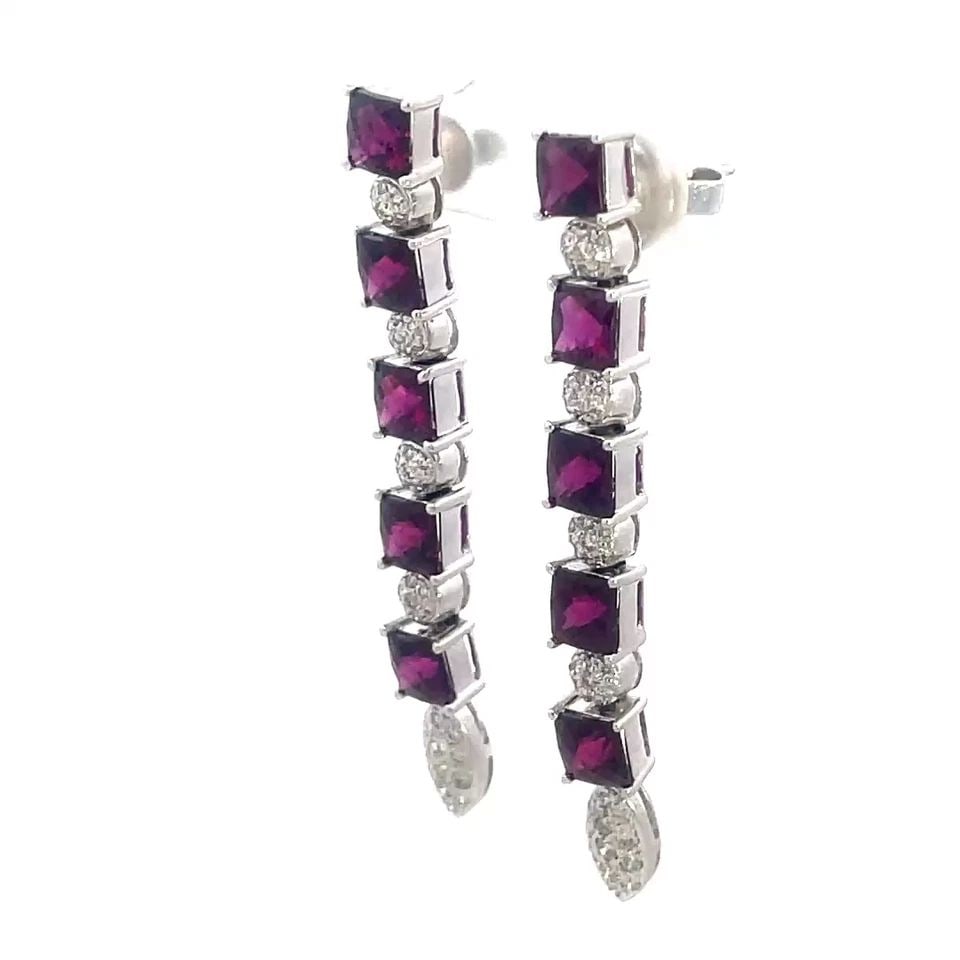 DIAMOND GOLD DANGLE EARRINGS 14K WHITE GEMSTONES SQUARE & PAVE SET: These lovely diamond and gold earrings are a pair of fine jewelry featuring a pavé set of diamond on round shape links which alternates with square shape prong set red gemstones, The earrings are mad