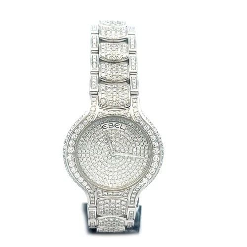 EBEL VANUA GOLD DIAMOND WRISTWATCH ICED OUT LADIES 18K WHITE QUARTZ ALL ORIGINAL: This stunning eye-catching Ebel's Iced Out diamond and 18k white gold wristwatch is a luxurious timepiece designed for women. With a full pave set white diamonds face, this watch exudes elegance and s