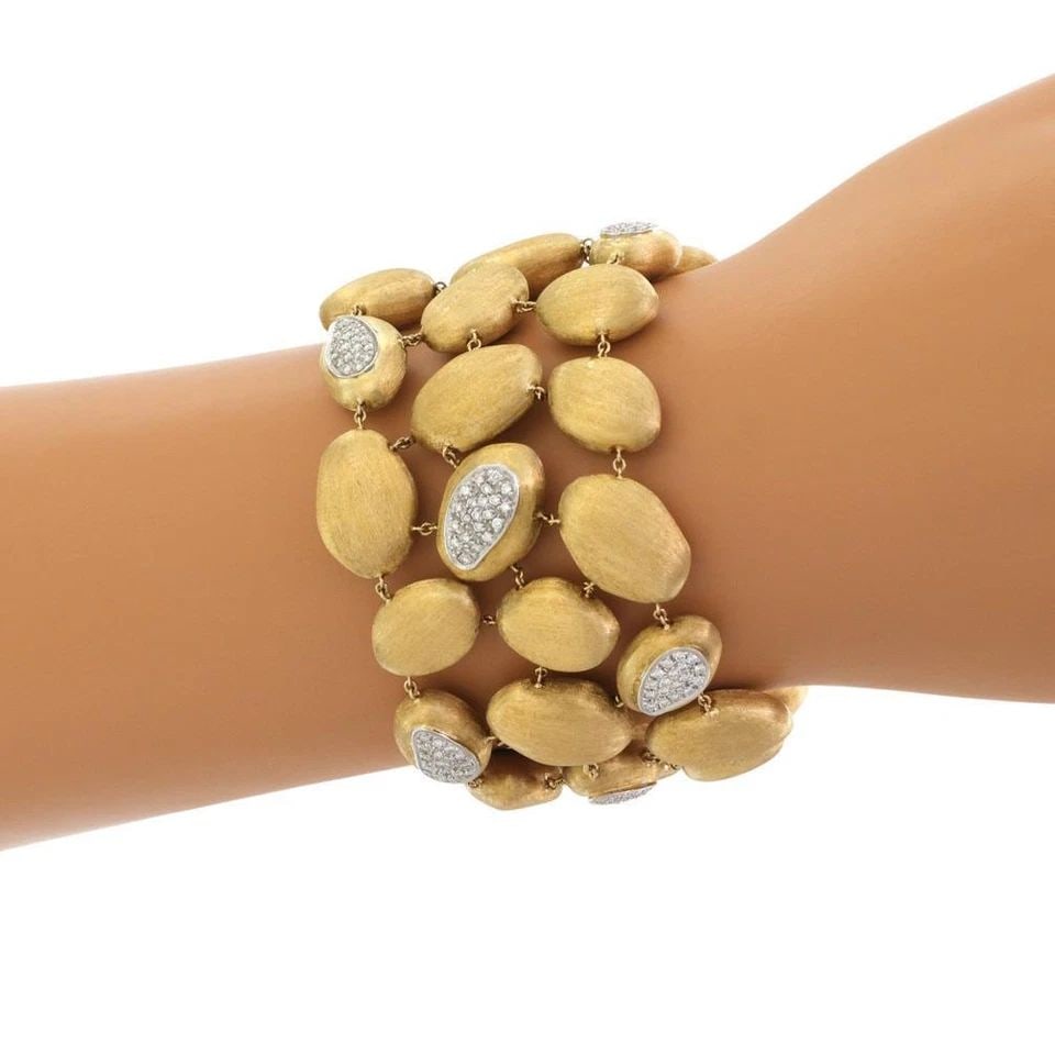 MARCO BICEGO SIVIGLIA 1.30CT DIAMOND 18K GOLD LARGE OVAL BEAD LINK BRACELET: MARCO BICEGO SIVIGLIA 1.30CT DIAMOND 18K GOLD LARGE OVAL BEAD LINK BRACELET Marco Bicego Siviglia 1.30ct Diamond 18k Gold Large Oval Bead Link Bracelet Description This gorgeous authentic wide bracele