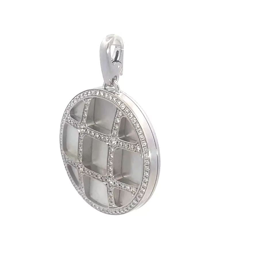 PASHA DE CARTIER GOLD PENDANT NATURAL DIAMOND 18K WHITE LATTICE MOTIF PAPER: This Cartier Pasha de Cartier Gold Pendant is a stunning piece of jewelry featuring a 29mm round frame with white shimmering mother of pearl and a beautiful pave set natural white diamond lattice gril