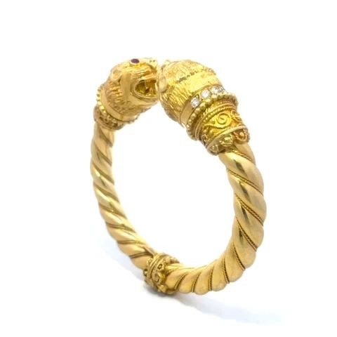 ILIAS LALAOUNIS DIAMOND LION GOLD BRACELET 18K YELLOW GEMSTONE 79 GRAMS VINTAGE: ILIAS LALAOUNIS DIAMOND LION GOLD BRACELET 18K YELLOW GEMSTONE 79 GRAMS VINTAGE This is an authentic double head bracelet by designer Ilias Lalaounis, it is crafted from 18k yellow gold featuring a la