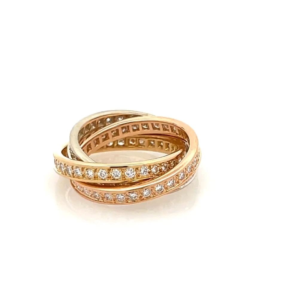 CARTIER RING TRINITY DIAMOND 18K TRICOLOR GOLD ROLLING BAND SIZE 6 W/PAPER: CARTIER RING TRINITY DIAMOND 18K TRICOLOR GOLD ROLLING BAND SIZE 6 W/PAPER The Cartier Ring Trinity Diamond 18k Tricolor Gold Rolling Band in size 6 is a luxurious and elegant piece of fine jewelry cr