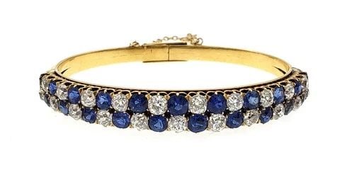 BRACELET DIAMOND & GEMSTONE 18K YELLOW GOLD VICTORIAN: BRACELET DIAMOND & GEMSTONE 18K YELLOW GOLD VICTORIAN This bracelet is an antique Victorian piece crafted from 18k yellow gold, featuring a round cut diamond as the main stone. The bangle style adds a
