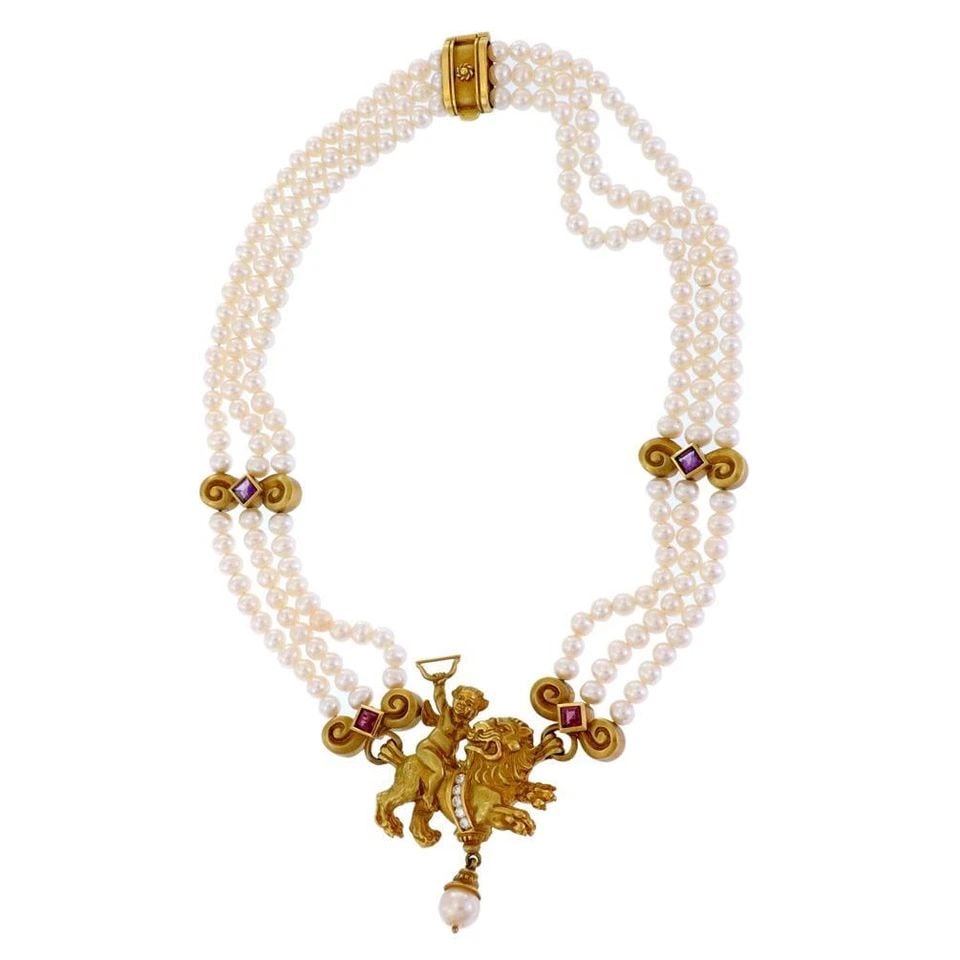 SEIDENGANG DIAMOND GEMS & PEARLS 18K GOLD CUPID ON LION 3 STRAND NECKLACE: SEIDENGANG DIAMOND GEMS & PEARLS 18K GOLD CUPID ON LION 3 STRAND NECKLACE Seidengang Diamond Gems & Pearls 18k Gold Cupid On Lion 3 Strand Necklace Description A gorgeous authentic choker/collar neckl