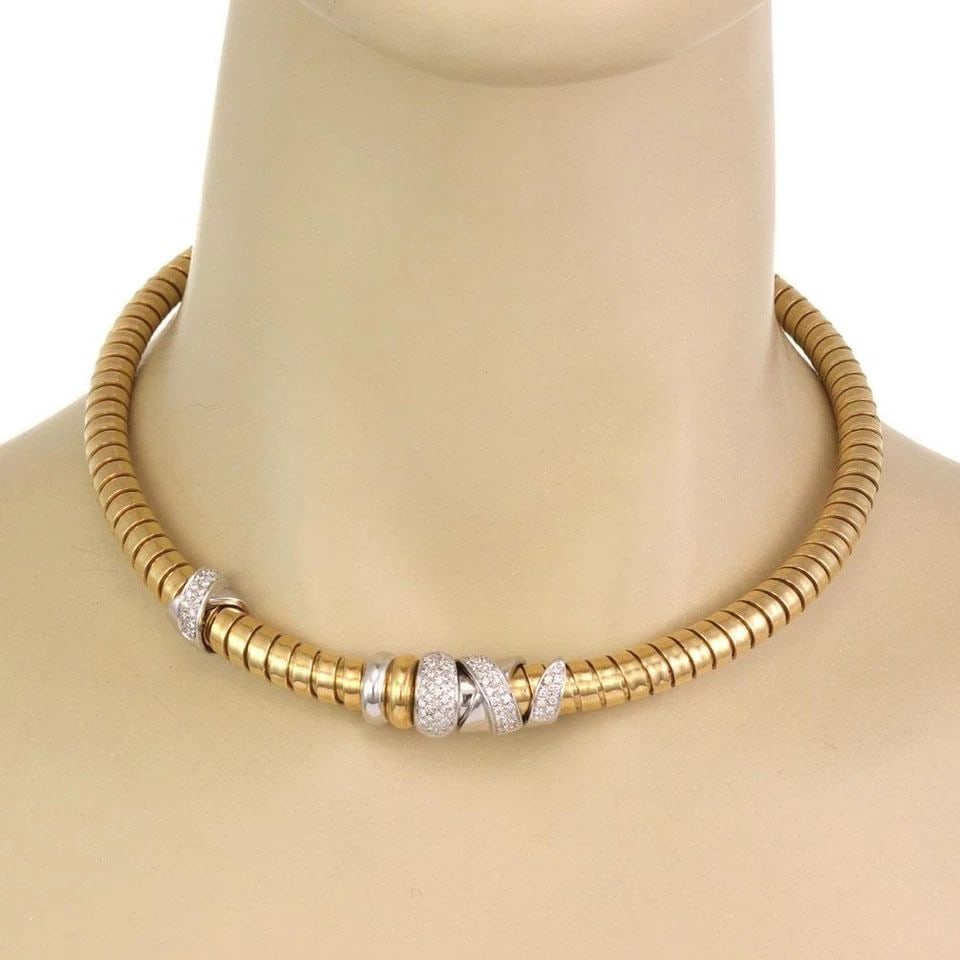 NOUVELLE BAGUE DIAMOND 18K GOLD FANCY TUBOGAS SPIRAL FLEX NECKLACE: NOUVELLE BAGUE DIAMOND 18K GOLD FANCY TUBOGAS SPIRAL FLEX NECKLACE Nouvelle Bague Diamond 18k Gold Fancy Tubogas Spiral Flex Necklace Description This is a stunning authentic necklace by Nouvelle Bagu