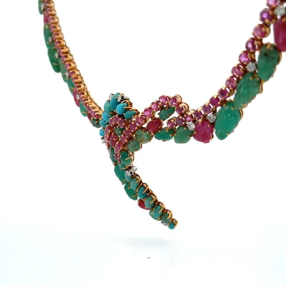 VINTAGE DIAMOND EMERALD & RUBY 18K YELLOW GOLD CENTERPIECE NECKLACE: This is a vintage handmade yellow gold necklace, it has leaf engraved emeralds cabochon marquise turquoise with leaf engraved rubies with round cut prong set rubies. The piece is exquisitely crafted i
