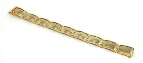 TIFFANY & CO. PICASSO BRACELET PLATINUM & 18K YELLOW GOLD: TIFFANY & CO. PICASSO BRACELET PLATINUM & 18K YELLOW GOLD The Tiffany & Co. Picasso Bracelet is a luxurious piece of fine jewelry crafted from platinum and 18k yellow gold. With a stylish slide closur
